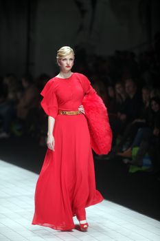 ZAGREB, CROATIA - MARCH 16: Fashion model wears clothes made by Aleksandra Dojcinovic on "Dove FASHION.HR" show on March 16, 2012 in Zagreb, Croatia.