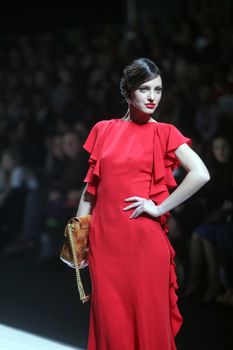 ZAGREB, CROATIA - MARCH 16: Fashion model wears clothes made by Aleksandra Dojcinovic on "Dove FASHION.HR" show on March 16, 2012 in Zagreb, Croatia.