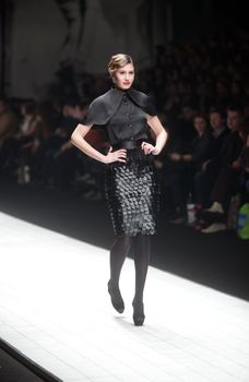 ZAGREB, CROATIA - MARCH 16: Fashion model wears clothes made by Aleksandra Dojcinovic on "Dove FASHION.HR" show on March 16, 2012 in Zagreb, Croatia.