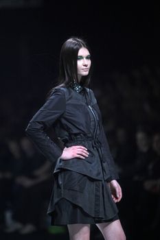 ZAGREB, CROATIA - MARCH 16: Fashion model wears clothes made by Ana Maria Ricov on "Dove FASHION.HR" show on March 16, 2012 in Zagreb, Croatia.