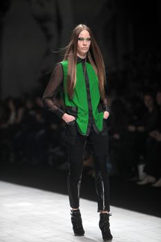 ZAGREB, CROATIA - MARCH 16: Fashion model wears clothes made by Ana Maria Ricov on "Dove FASHION.HR" show on March 16, 2012 in Zagreb, Croatia.