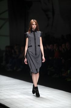 ZAGREB, CROATIA - MARCH 16: Fashion model wears clothes made by Ana Maria Ricov on "Dove FASHION.HR" show on March 16, 2012 in Zagreb, Croatia.