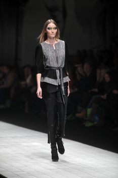 ZAGREB, CROATIA - MARCH 16: Fashion model wears clothes made by Ana Maria Ricov on "Dove FASHION.HR" show on March 16, 2012 in Zagreb, Croatia.