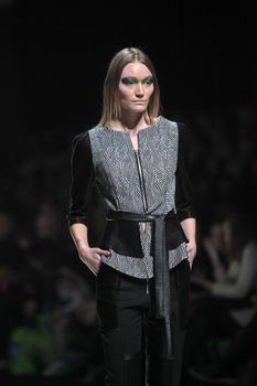 ZAGREB, CROATIA - MARCH 16: Fashion model wears clothes made by Ana Maria Ricov on "Dove FASHION.HR" show on March 16, 2012 in Zagreb, Croatia.