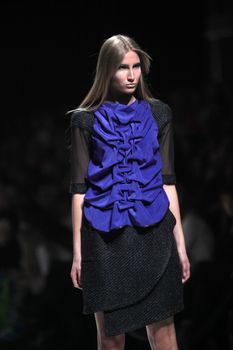 ZAGREB, CROATIA - MARCH 16: Fashion model wears clothes made by Ana Maria Ricov on "Dove FASHION.HR" show on March 16, 2012 in Zagreb, Croatia.