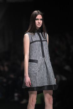 ZAGREB, CROATIA - MARCH 16: Fashion model wears clothes made by Ana Maria Ricov on "Dove FASHION.HR" show on March 16, 2012 in Zagreb, Croatia.