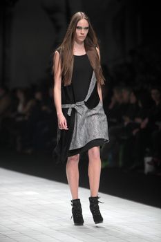 ZAGREB, CROATIA - MARCH 16: Fashion model wears clothes made by Ana Maria Ricov on "Dove FASHION.HR" show on March 16, 2012 in Zagreb, Croatia.
