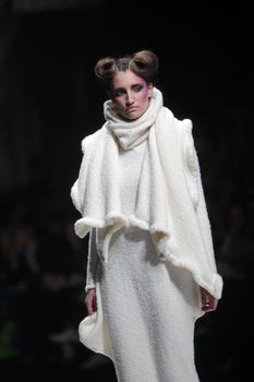 ZAGREB, CROATIA - MARCH 16: Fashion model wears clothes made by Arena by Galas on "Dove FASHION.HR" show on March 16, 2012 in Zagreb, Croatia.