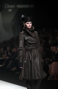 ZAGREB, CROATIA - MARCH 17: Fashion model wears clothes made by Branka Donassy on "Dove FASHION.HR" show on March 17, 2012 in Zagreb, Croatia.