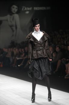 ZAGREB, CROATIA - MARCH 17: Fashion model wears clothes made by Branka Donassy on "Dove FASHION.HR" show on March 17, 2012 in Zagreb, Croatia.