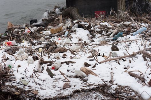 Pile of garbage covered with snow