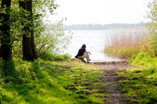 relaxed woman at a lake