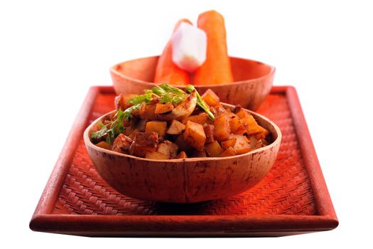 Indian potato curry called aloo subzi made with masala, potato, tadka and coriander garnishing