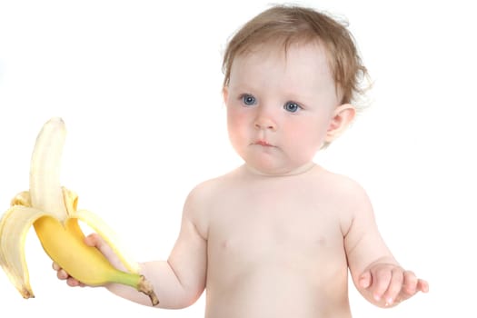 the little blue-eyed girl eats banana. a portrait on a white background. option 1