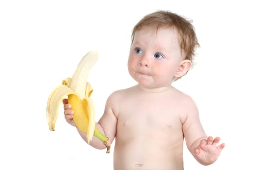 the little blue-eyed girl eats banana. a portrait on a white background. option 6