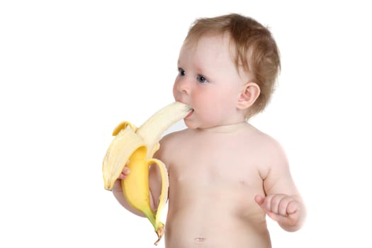 the little blue-eyed girl eats banana. a portrait on a white background. option 7
