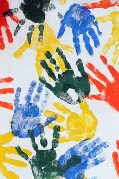 Colorful hand imprints in various shapes and patterns