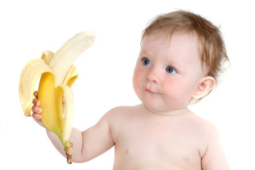 the little blue-eyed girl eats banana. a portrait on a white background. option 4
