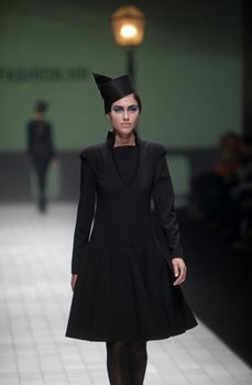 ZAGREB, CROATIA - MARCH 17: Fashion model wears clothes made by Branka Donassy on "Dove FASHION.HR" show on March 17, 2012 in Zagreb, Croatia.