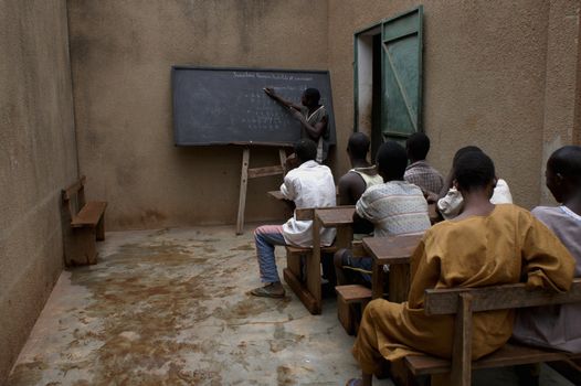 Bobo Dioulasso, Burkina Faso - February 19, 2005: Children imprisoned at school.Prisons of living dangerously mixed adults association Terres des Hommes and transfers these specific rehabilitation center Laye