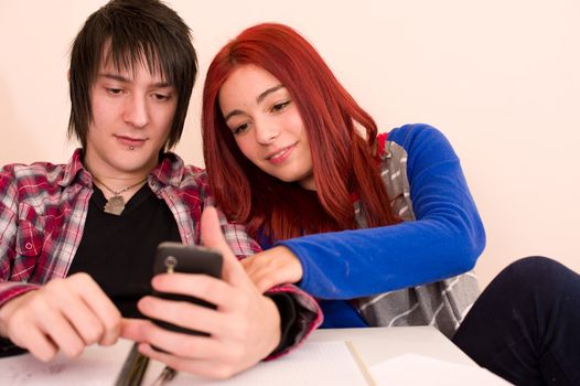 Teenage friends using a smartphone