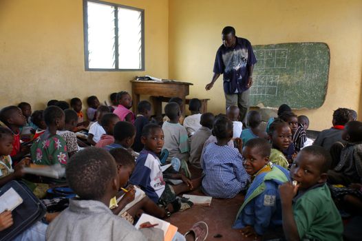 Beira,Mozambique-January 10,2010:Class in elementary in Beira.Swiss woman,Barbara Hofmann,since 1989,after seeing the reality of war has opened a center in its structure and collects child war victims,orphans and abandoned giving them the education