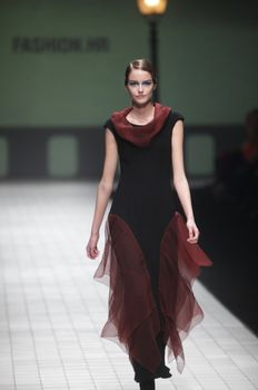 ZAGREB, CROATIA - MARCH 17: Fashion model wears clothes made by Branka Donassy on "Dove FASHION.HR" show on March 17, 2012 in Zagreb, Croatia.