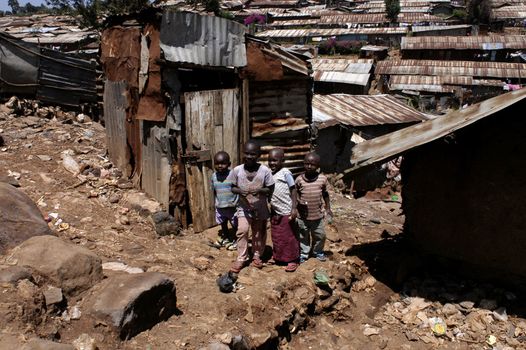 Nairobi, Kenya-January 27, 2004:children living in Kibera.Is the largest slum in Africa in the center of Nairobi.There are no toilets,the sewers are open.There are many orphans, and HIV disease,malaria
