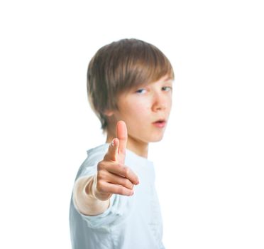 Close up portrait of young smiling cute teenager in white, focus of fingers. isolated on white.