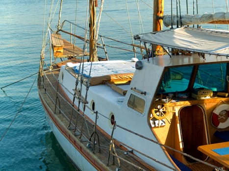 Anchored yacht with blue sea