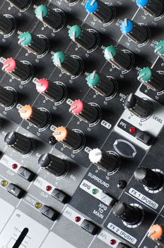 Part of an audio sound mixer with buttons