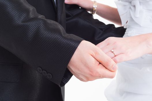 Bride and groom holding hand