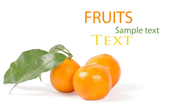 Tangerines with green leaves isolated on white