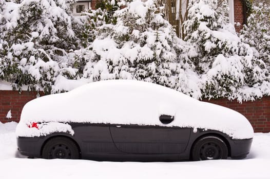 Snow covered car