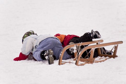 sledding in a snow covered landscape