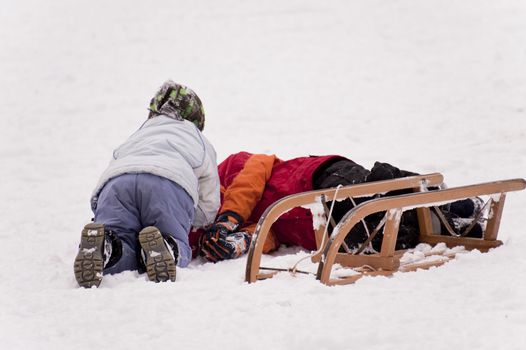 sledding in a snow covered landscape