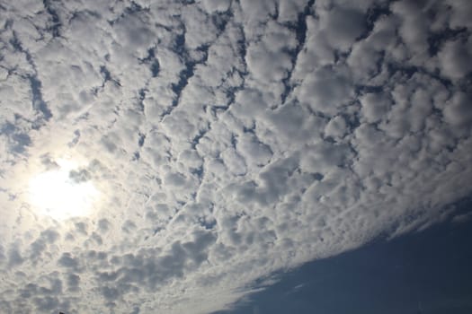 white clouds on blue sky