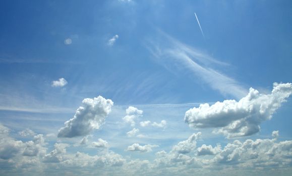 white clouds on blue sky