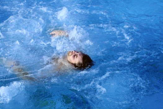 young attractive man relax in spa area