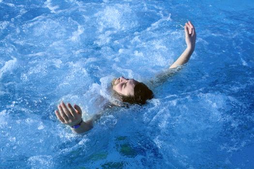 young attractive man relax in spa area