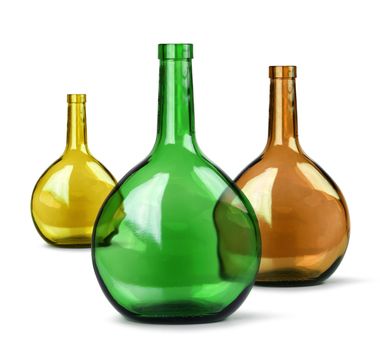Exotic colorful glass bottles isolated on white background