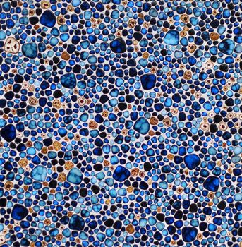 Colorful round edges blue brown stones mosaic background