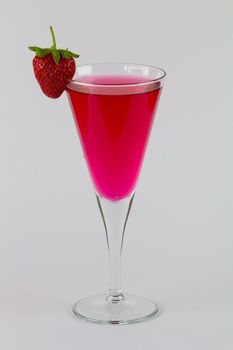 A Strawberry flavoured Cocktail with a strawberry garnish