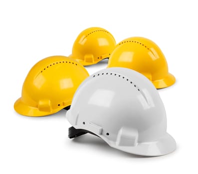 Four hard hat work team, protective safety helmets isolated