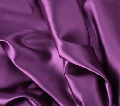 Wavy folded luxury shiny satin silk background