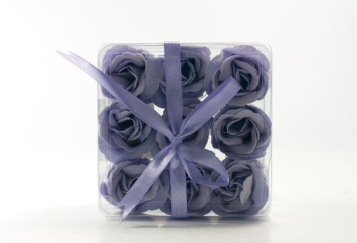 purple decoration roses as present in a box