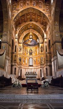 Medieval Norman architecture. Cathedral of Monreale, interior with its golden mosaics.