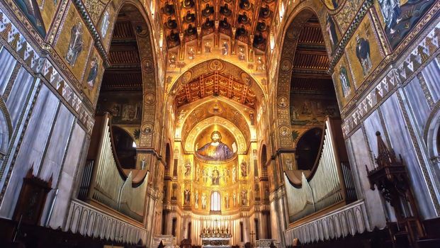 Medieval Norman architecture. Cathedral of Monreale, interior with its golden mosaics.