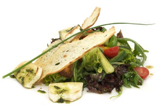 salad vegetables and goat cheese on a white background