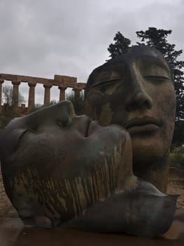 Greek temple of Agrigento with modern sculture. Sicily- Italy